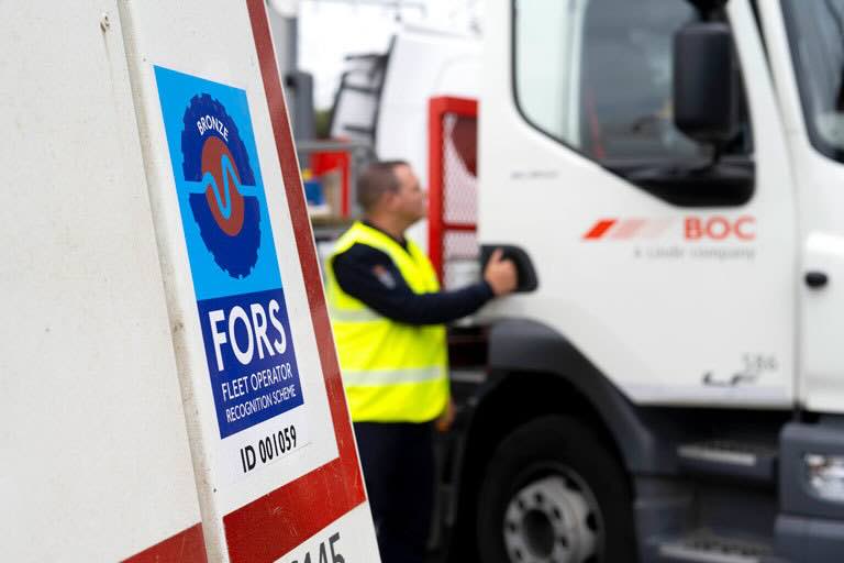 FORS sticker person opening lorry door